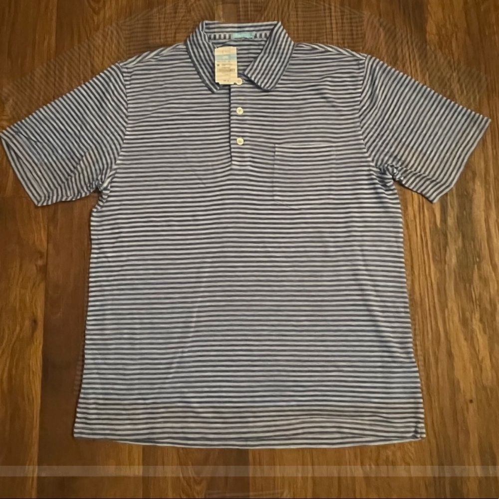 Brand new polo with tags